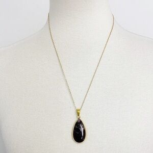 Women’s gold tone purple teardrop statement necklace